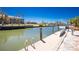 Dock with boat lift and ladder for access to the canal at 1957 Arkansas Ave, Englewood, FL 34224