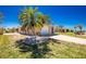 Lovely home with a brick driveway and an established landscape at 1957 Arkansas Ave, Englewood, FL 34224