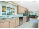 Well-appointed kitchen with stainless steel appliances and stylish countertops at 1957 Arkansas Ave, Englewood, FL 34224