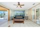 Comfortable living space with sliding doors to the outside at 1957 Arkansas Ave, Englewood, FL 34224