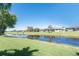 Expansive backyard features a serene waterfront view, perfect for outdoor enjoyment at 228 White Marsh Ln, Rotonda West, FL 33947