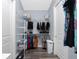 Walk-in closet features wire shelving units for storage and organization at 228 White Marsh Ln, Rotonda West, FL 33947