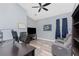 Spacious office with wood-look floors, a ceiling fan, and comfortable seating at 228 White Marsh Ln, Rotonda West, FL 33947