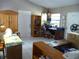 Office space with desk, shelves, and natural light, suitable for remote work at 26191 Angelica Rd, Punta Gorda, FL 33955
