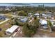 Aerial view of a home near the ocean with surrounding residential neighborhood at 3021 Holly Ave, Englewood, FL 34224