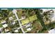 Aerial view of the property highlighting the lot and surrounding neighborhood in Charlotte County, Florida at 3021 Holly Ave, Englewood, FL 34224