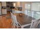 The dining room features lots of natural light and is located conveniently next to the kitchen at 3021 Holly Ave, Englewood, FL 34224