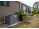 A clean, modern AC unit is next to the house at 3021 Holly Ave, Englewood, FL 34224