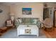 The living room has lots of natural light and a ceiling fan at 3021 Holly Ave, Englewood, FL 34224