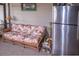 Screened-in porch with outdoor seating, refrigerator, and plenty of space at 3021 Holly Ave, Englewood, FL 34224