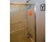 Close-up of a shower featuring updated fixtures, including a shower head and handles at 3021 Holly Ave, Englewood, FL 34224