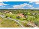 Estate on a large lot with private driveway and mature trees in a park-like setting at 3700 Como St, Port Charlotte, FL 33948