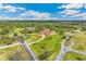 Estate home with circular drive and mature landscaping in a secluded, wooded setting at 3700 Como St, Port Charlotte, FL 33948