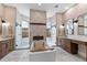 Stunning bathroom features dual shower rooms, a soaking tub, and double vanities at 3700 Como St, Port Charlotte, FL 33948