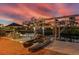 Dock and boat lift overlooking the water with lounge chairs and boat access at 3700 Como St, Port Charlotte, FL 33948