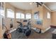 Well-lit music room featuring a full drum set, guitars, and ample space for jam sessions at 3700 Como St, Port Charlotte, FL 33948
