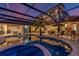 Relax and unwind by this elegant pool and spa area, perfect for entertaining guests or enjoying quiet evenings at 3700 Como St, Port Charlotte, FL 33948