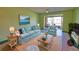 Inviting living room with comfortable seating, neutral colors, and lots of natural light at 405 Pine Hollow Cir # 405, Englewood, FL 34223
