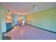 A charming dining room features a table with seating for four and custom lighting at 405 Pine Hollow Cir # 405, Englewood, FL 34223