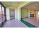 Inviting living room showcasing an open layout and seamless access to an outdoor lanai at 405 Pine Hollow Cir # 405, Englewood, FL 34223