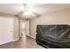 A spacious bedroom with tile flooring, neutral paint, and walk-in closet at 4238 Golfair Ln, North Port, FL 34288