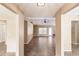 Spacious living room with tile flooring, neutral paint, and bright windows at 4238 Golfair Ln, North Port, FL 34288