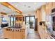 This bright kitchen offers an island gas range and lots of counter space, perfect for entertaining at 50 Tarpon Way, Placida, FL 33946