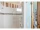 Clean, modern shower with white tiles and decorative mosaic accents at 50 Tarpon Way, Placida, FL 33946