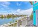 Scenic view from a spacious deck, showcasing the waterfront and the surrounding neighborhood at 50 Tarpon Way, Placida, FL 33946
