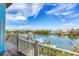 Scenic view from a spacious deck, showcasing the waterfront and the surrounding neighborhood at 50 Tarpon Way, Placida, FL 33946