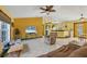 Spacious living room with an open layout and easy access to the kitchen and dining areas at 6345 Bodmin Ln, North Port, FL 34291