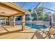 Enjoy this beautiful screened pool with covered lanai, perfect for entertaining at 6345 Bodmin Ln, North Port, FL 34291