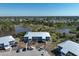 Scenic aerial view of the condo complex surrounded by lush landscaping and serene lakes at 6800 Placida Rd # 272, Englewood, FL 34224