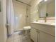 Bathroom featuring a white vanity with a solid surface countertop and a shower-tub combo at 6800 Placida Rd # 272, Englewood, FL 34224