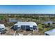 Attractive condo building overlooking a peaceful pond, with lush greenery at 6800 Placida Rd # 272, Englewood, FL 34224