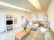 Bright and airy living room with a ceiling fan, neutral decor, and an open floor plan at 6800 Placida Rd # 272, Englewood, FL 34224