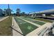 Two shuffleboard courts with seating and picnic area in a picturesque Florida community at 6800 Placida Rd # 272, Englewood, FL 34224
