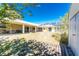 The backyard has a shed on the side and patio behind the house at 7328 Yardley St, Englewood, FL 34224