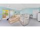 Spacious main bedroom features seating area and access to the lanai at 7328 Yardley St, Englewood, FL 34224