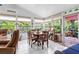 Dining room featuring a table for six and an outside view at 7339 Thomas St, Englewood, FL 34224