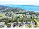 Expansive aerial view of a coastal neighborhood with lush greenery and beautiful waterfront scenery at 745 Sesame St, Englewood, FL 34223