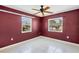 Bedroom with two windows and tile flooring at 745 Sesame St, Englewood, FL 34223