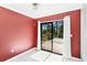 Bedroom showcasing large sliding glass doors and offering great natural light, perfect for relaxation at 745 Sesame St, Englewood, FL 34223