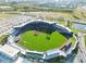 Aerial view of the CoolToday Park baseball stadium with green field and extensive seating at 8784 Mystic Cir, North Port, FL 34287