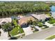 Overhead view of the house showcases a community's waterfront living with boat docks and water access at 8784 Mystic Cir, North Port, FL 34287