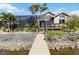 Waterfront home features a private dock and scenic views, providing an idyllic coastal lifestyle at 8784 Mystic Cir, North Port, FL 34287
