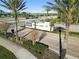 Wellen Park community entrance with prominent signage and well-maintained landscaping on a sunny day at 8784 Mystic Cir, North Port, FL 34287