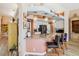 Kitchen island boasts granite counters and seating for three at 8784 Mystic Cir, North Port, FL 34287