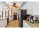 Bright kitchen with stainless steel appliances and granite counters at 8784 Mystic Cir, North Port, FL 34287