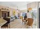 Bright living room with tiled floors, high ceilings, and ample natural light at 8784 Mystic Cir, North Port, FL 34287